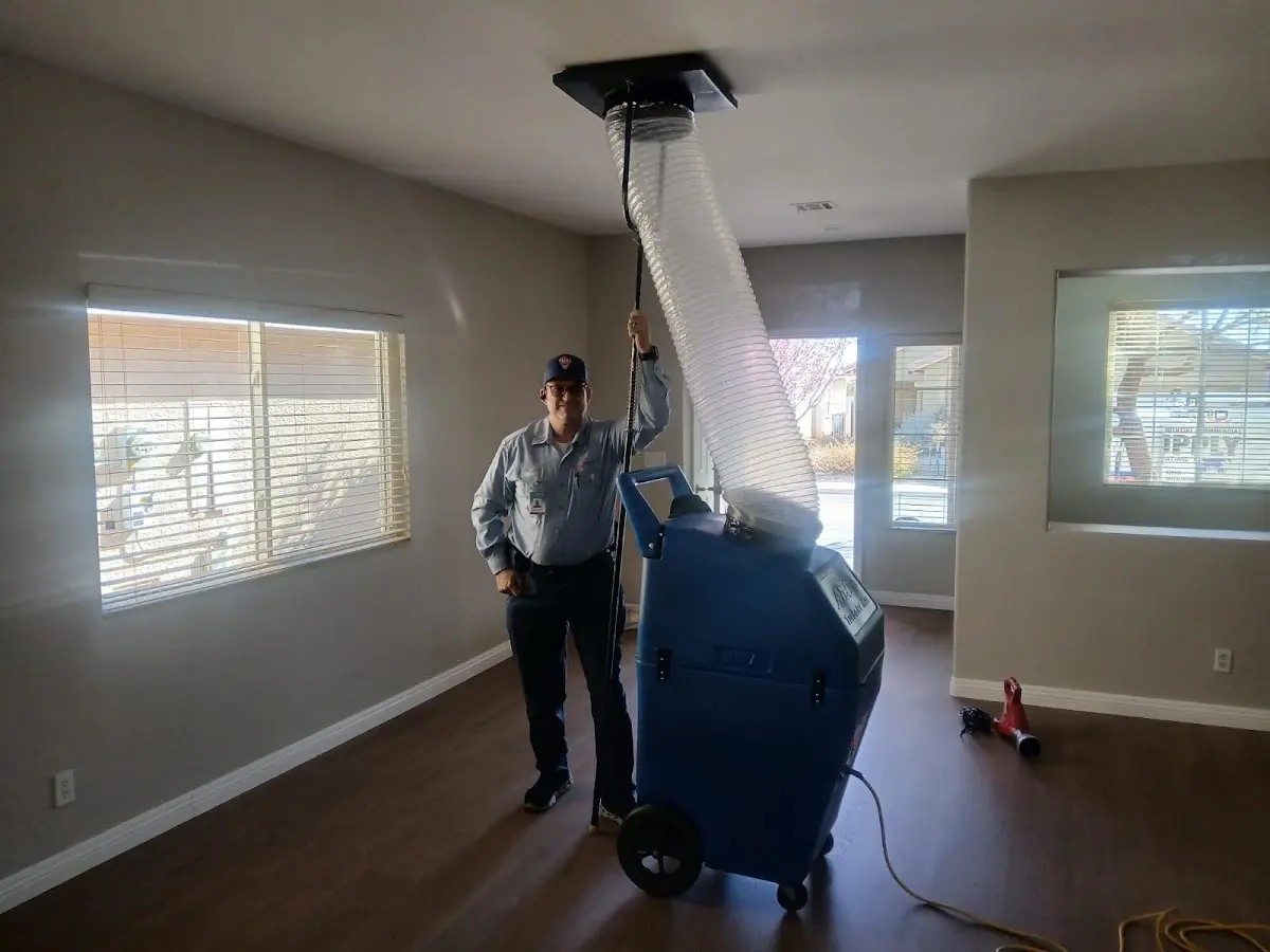 Professional Dryer Vent Cleaning work inside a Chesterland home
